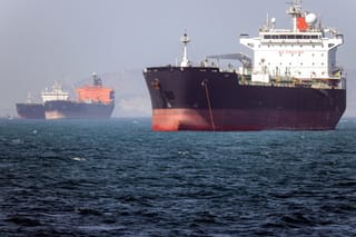In this picture obtained from Iran's ISNA news agency on May 2, 2026, the Gambia-flagged tanker vessel Bili is pictured anchored in the Strait of Hormuz off Bandar Abbas in southern Iran.