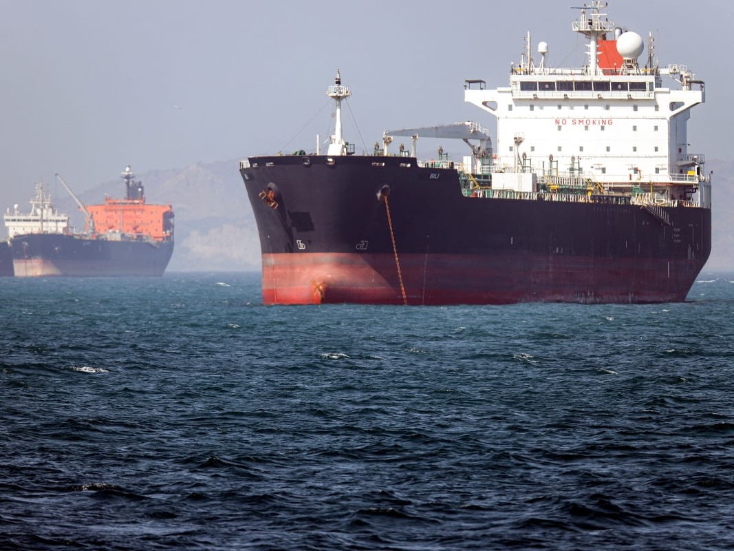 A ceasefire between Iran and the United States was teetering Monday as the two countries traded fire over the strategic Strait of Hormuz and the United Arab Emirates reported attacks for the first time since the truce was declared nearly a month ago.