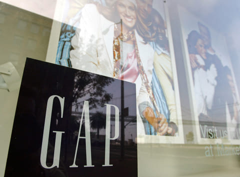 A window display shows current clothing styles at the headquarters of the Gap in San Francisco, Thursday, Nov. 18, 2004. (AP Photo/Eric Risberg,File)