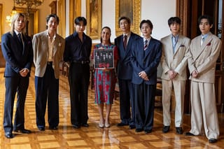 Handout picture released by Mexico's presidency press office showing Mexico’s President Claudia Sheinbaum with South Korea's K-pop band BTS at the Palacio Nacional in Mexico City on May 6, 2026.