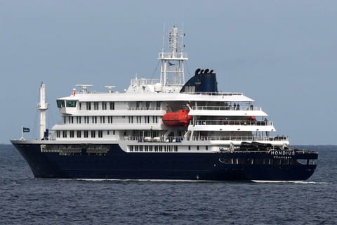 The MV Hondius cruise ship departs the port in Praia, Cape Verde, Wednesday, May 6, 2026.