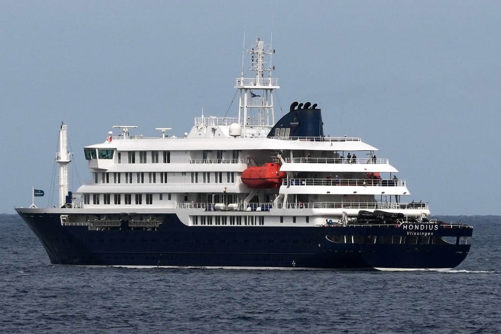 The MV Hondius cruise ship departs the port in Praia, Cape Verde, Wednesday, May 6, 2026.