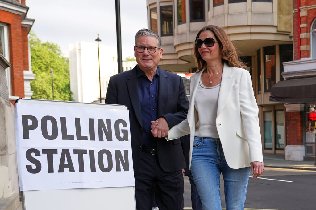 Britain's Prime Minister Keir Starmer and wife Victoria arrive at a polling station in central London, Thursday, May 7, 2026 to cast their votes in the local elections.