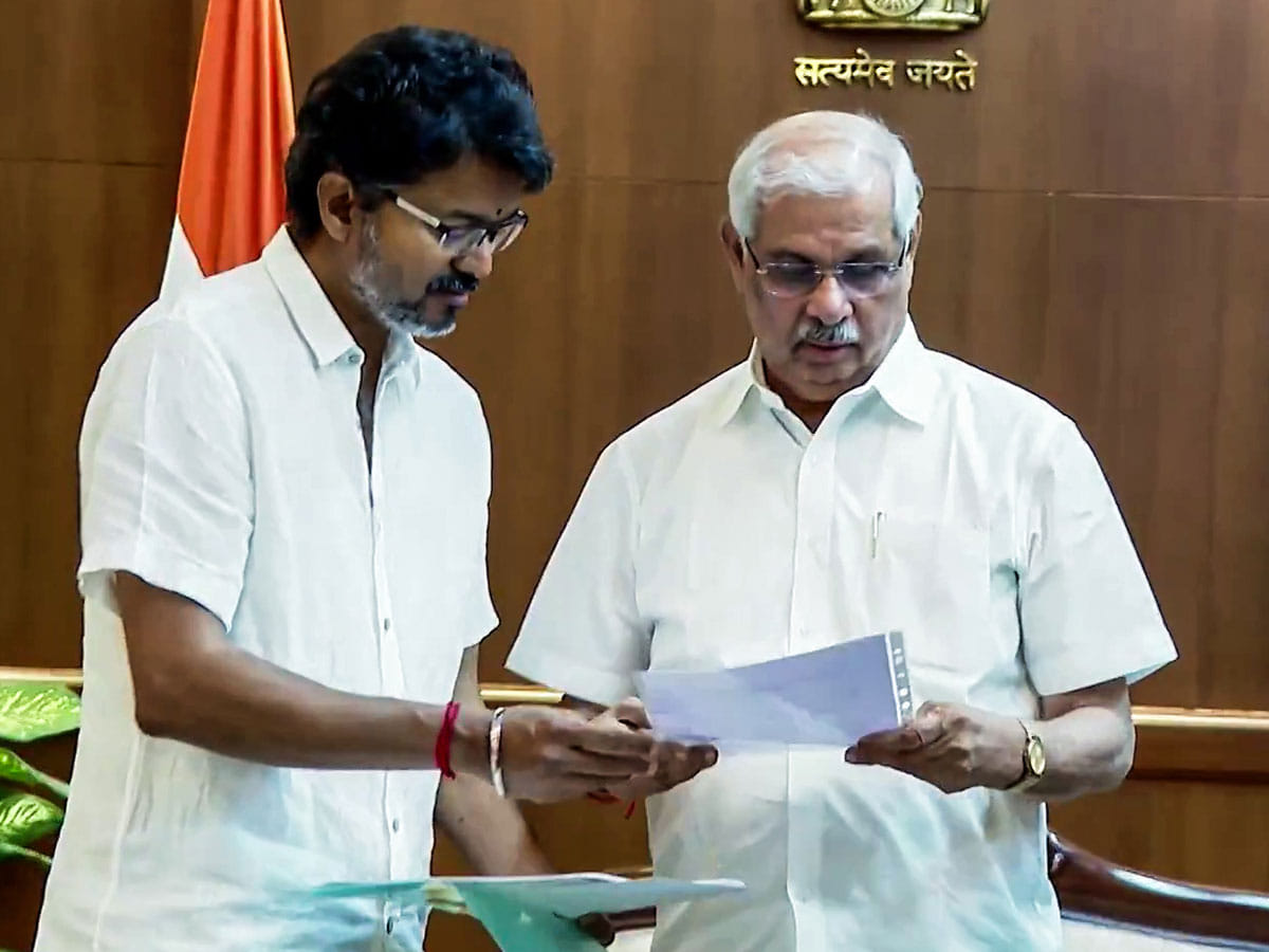 TVK chief Vijay meets Tamil Nadu Governor Rajendra Arlekar to stake claim to form the government at Lok Bhavan, in Chennai on Friday, May 8, 2026. 