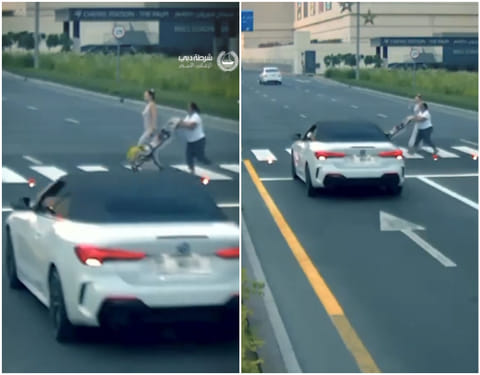 A video released by Dubai Police shows a dangerous near-miss at a pedestrian crossing where a child in a stroller narrowly avoided being hit, highlighting road safety concerns.