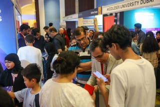 Families exploring universities and academic pathways at Edufair