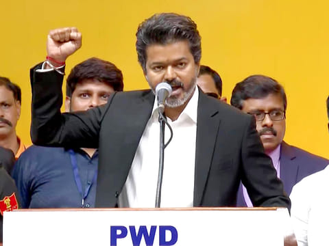 Tamilaga Vettri Kazhagam (TVK) chief Joseph Vijay speaks during the oath taking ceremony at the Jawaharlal Nehru Stadium, in Chennai on Sunday. 