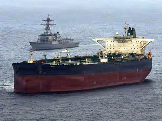 US Central Command Public Affairs, shows the Arleigh Burke-class guided-missile destroyer USS Rafael Peralta (DDG 115) implementing a maritime blockade against the Iran-flagged crude oil tanker vessel Herby while the latter was attempting to sail toward an Iranian port, on April 24, 2026.