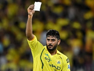 Chennai Super Kings' Indian cricket player Urvil Patel holds up a note as he celebrates after scoring a half-century (50 runs) during the 2026 Indian Premier League (IPL) T20 match between Chennai Super Kings and Lucknow Super Giants 