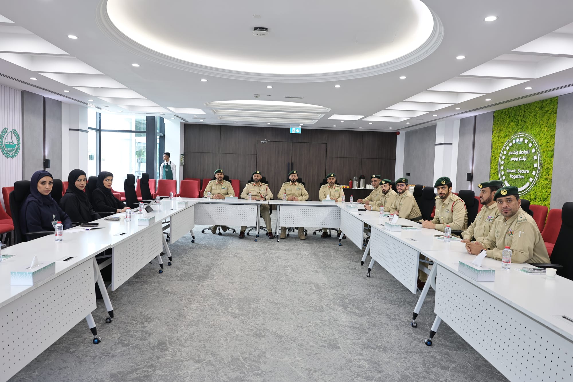 Dubai Police officers discuss future-ready security solutions for desert communities