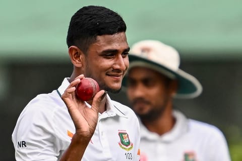 Bangladesh's Nahid Rana acknowledges the crowd after taking a five-wicket haul after his team's win.