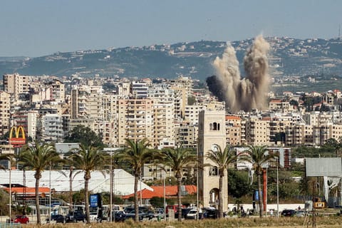 An explosion erupts in the area of Al Housh following Israeli bombardment as seen from Tyre in southern lebanon on May 12, 2026.