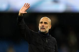 Manchester City's Spanish manager Pep Guardiola waves to the fans following the English Premier League football match between Manchester City and Crystal Palace at the Etihad Stadium in Manchester, north west England, on May 13, 2026.