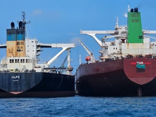 This handout photo from United Against Nuclear Iran shows two oil tankers making a ship-to-ship transfer of Iranian oil in the Eastern Outer Port Limits (EOPL), 70 kilometers off Malaysia. 