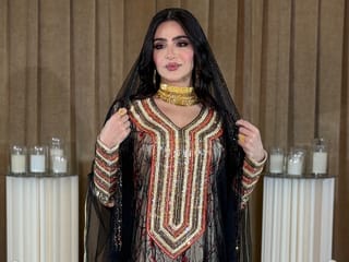 The Mukhawar is a full-length Emirati jalabiya celebrated for its hand-crafted embroidery and rich fabrics