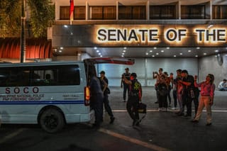 Members of the Scene of the Crime Operatives (SOCO) arrive after the exchange of gunshots inside the Senate of the Philippines in Pasay, Metro Manila on May 13, 2026.