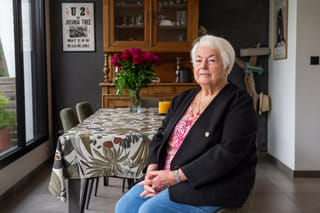 Marie-Therese Ross-Mahe, an 85-year-old French widow of a U.S. military veteran, poses in Orvault, western France, during an interview with The Associated Press, Monday, May 11, 2026. (AP Photo/Mathieu Pattier)