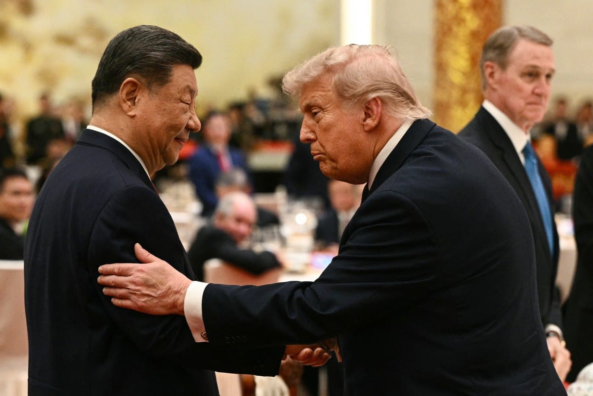 Trump and Xi meet for high-stakes talks in Beijing

Chinese leader welcomed US President with a handshake for a superpower summit