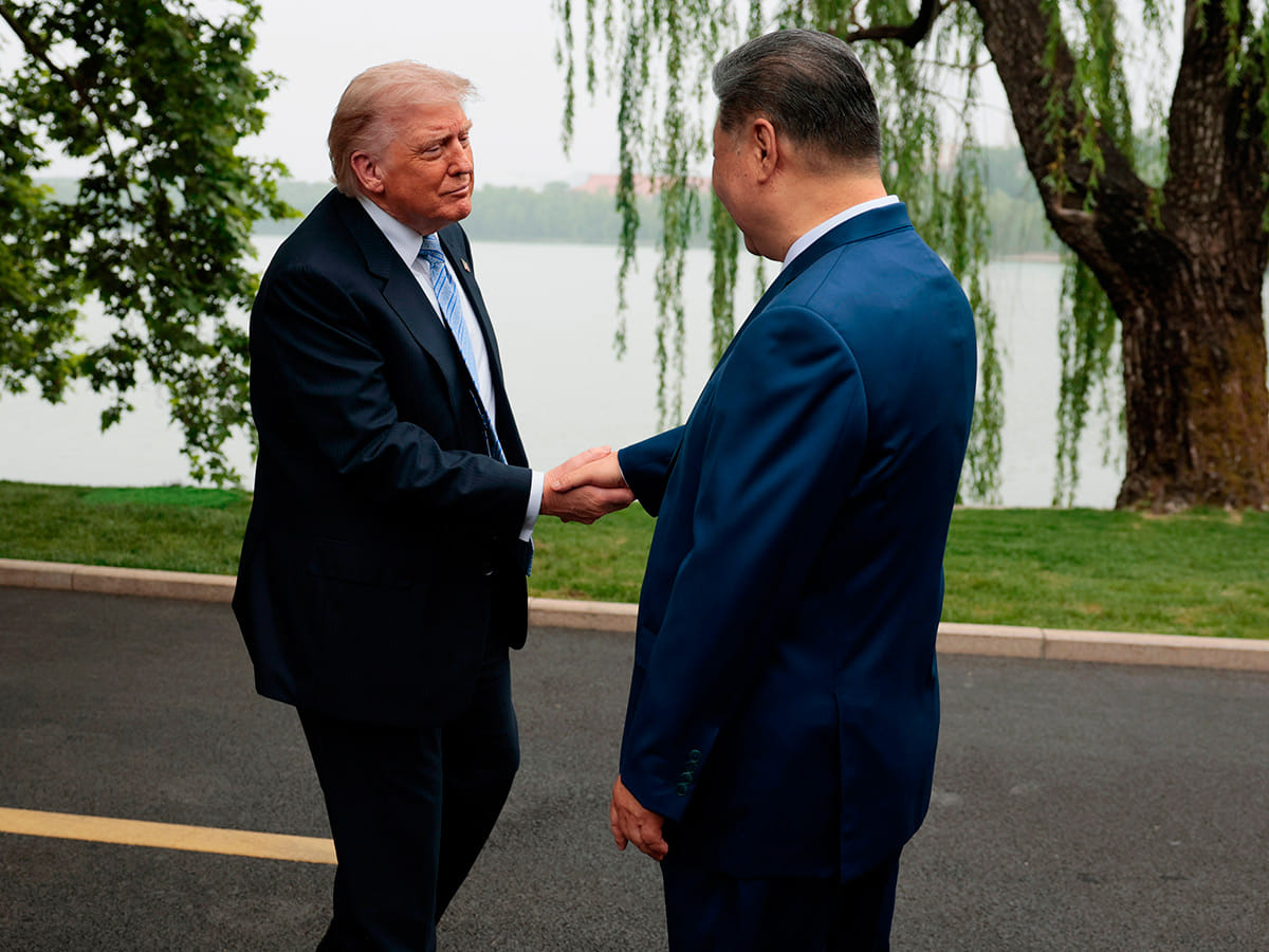 U.S. President Donald Trump, left, shakes hands with Chinese President Xi Jinping at Zhongnanhai Garden in Beijing, China.