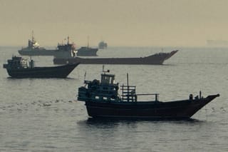 Vessels are seen anchored in the Strait of Hormuz, off the port city of Khasab on Oman’s northern Musandam Peninsula on May 17, 2026.