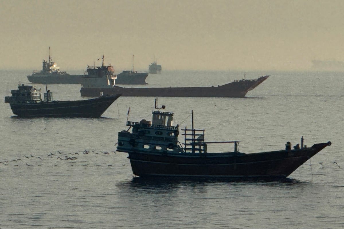 Vessels are seen anchored in the Strait of Hormuz, off the port city of Khasab on Oman’s northern Musandam Peninsula on May 17, 2026.