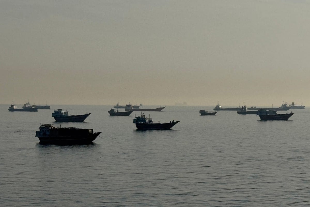 Vessels are seen anchored in the Strait of Hormuz, off the port city of Khasab on Oman’s northern Musandam Peninsula on May 17, 2026.