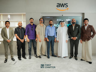 Abdulla Poyil, Chairman of Al Madina Group, marks the inauguration of the agentic portal at Dubai AI Campus alongside distinguished guests.