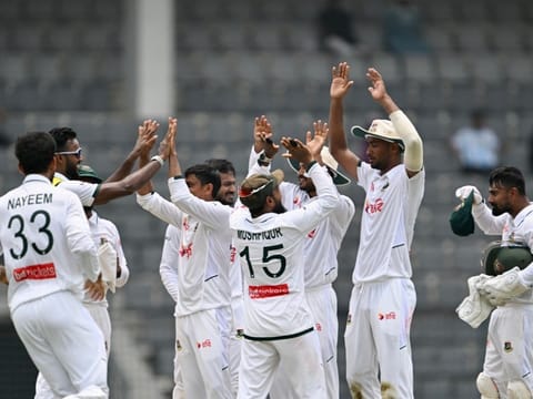 Bangladesh's players celebrate after winning the second test match against Pakistan at the Sylhet International Cricket Stadium in Sylhet 