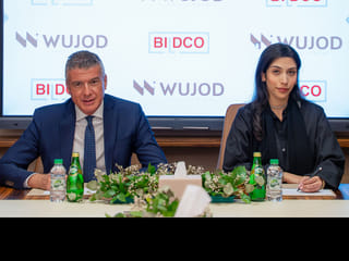 Shamsa Sulaiman Alfahim and Issa Ataya at the agreement signing ceremony.