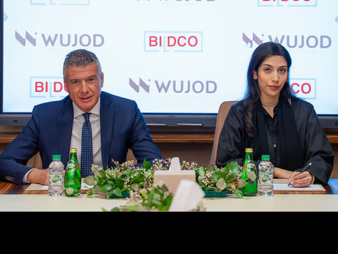 Shamsa Sulaiman Alfahim and Issa Ataya at the agreement signing ceremony.