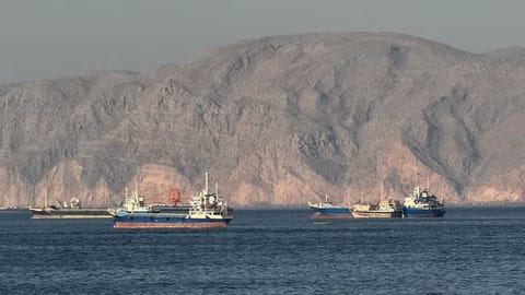 The Islamic Revolutionary Guard Corps (IRGC) Navy claimed on May 22 that 35 vessels transited the strait over a 24-hour period after obtaining Iranian “permission” and receiving Iranian “security” protection. Analysts say a renewed tanker traffic may reflect growing optimism around backchannel diplomacy as US President Donald Trump suggested progress in talks with Tehran and hinted that the conflict could de-escalate and oil prices could go down “very quickly.” File photo shows ships at Anchor in the Strait of Hormuz, off Oman's northern coast.