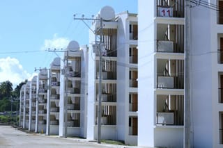 SOCIALISED CONDOMINIUM UNITS: Some of the 72 five-storey condominium buildings with a total of 7,200 housing units built in Calinan, Davao City. Located in People’s Ville, a 14.23-hectare property, the development also includes around two hectares of open spaces dedicated to parks, playgrounds, and community recreation areas for residents.