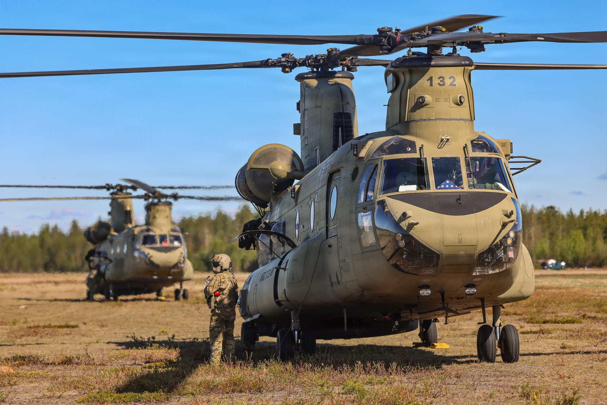 Soldiers from 1-214th Aviation, 12th CAB, refuel CH-47 Chinooks at a forward area refueling point on Kajaani Airfield, Finland, during #Sword26. 