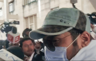 Police take Twisha Sharma's husband into custody after he appears in Jabalpur court.