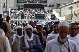 Muslim worshippers leave the Grand Mosque complex after offering prayers in the holy city of Mecca on May 24, 2026, ahead of the annual Hajj pilgrimage.