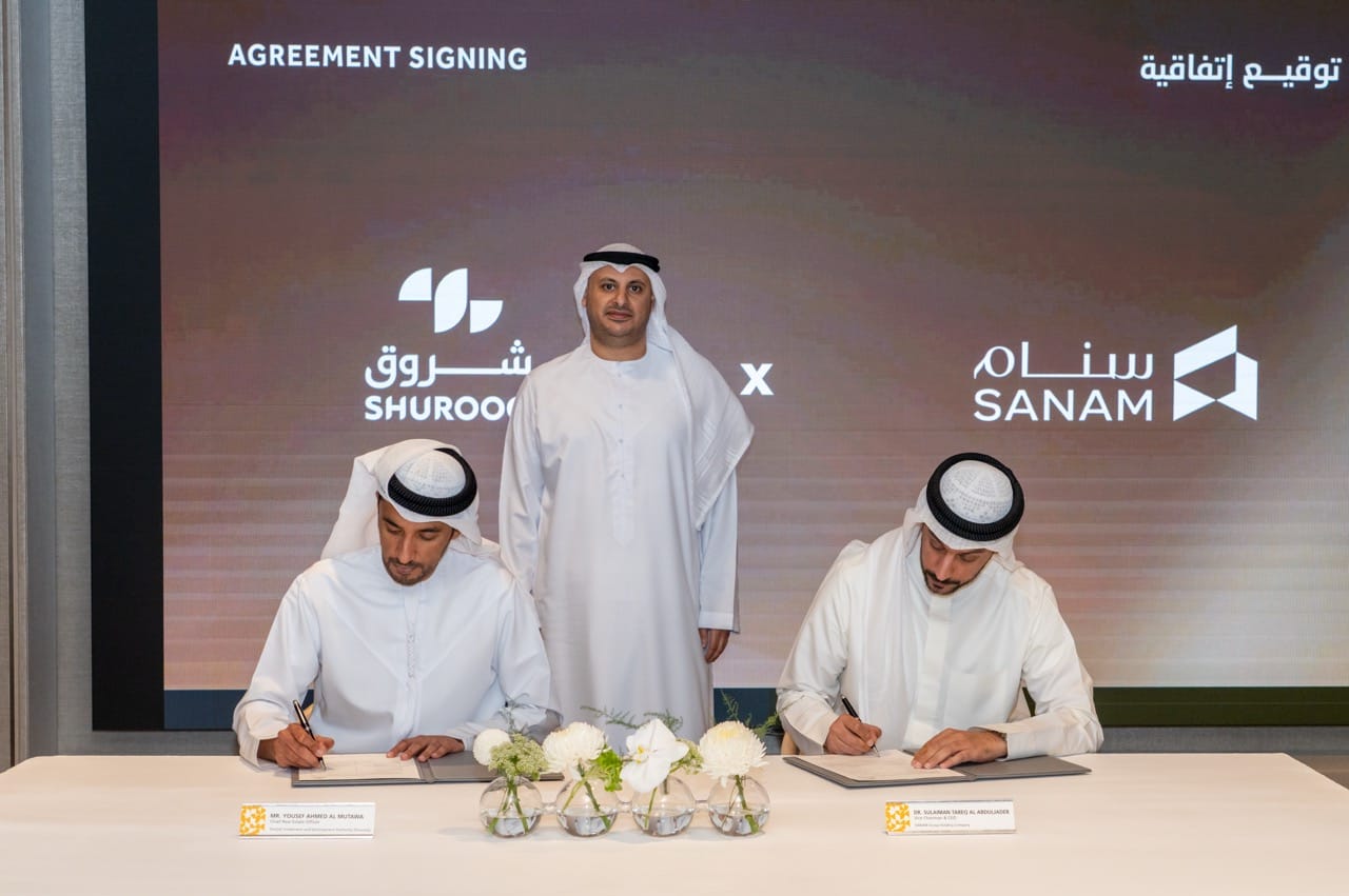 Yousif Al Mutawa and Dr Sulaiman Tareq Al Abduljader during the agreement signing ceremony in the presence of Ahmed Obaid Al Qaseer, CEO of Shurooq.