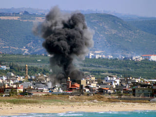 Smoke rises following an Israeli airstrike on the Rashidieh Palestinian refugee camp in the Tyre district of southern Lebanon.