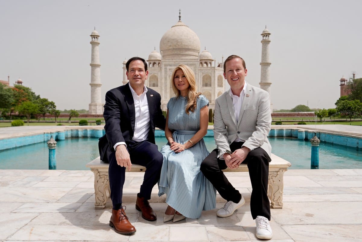US Secretary of State Marco Rubio (L), his wife Jeanette (C) and US ambassador to India Sergio Gor pose for pictures at the Taj Mahal in Agra on May 25, 2026.