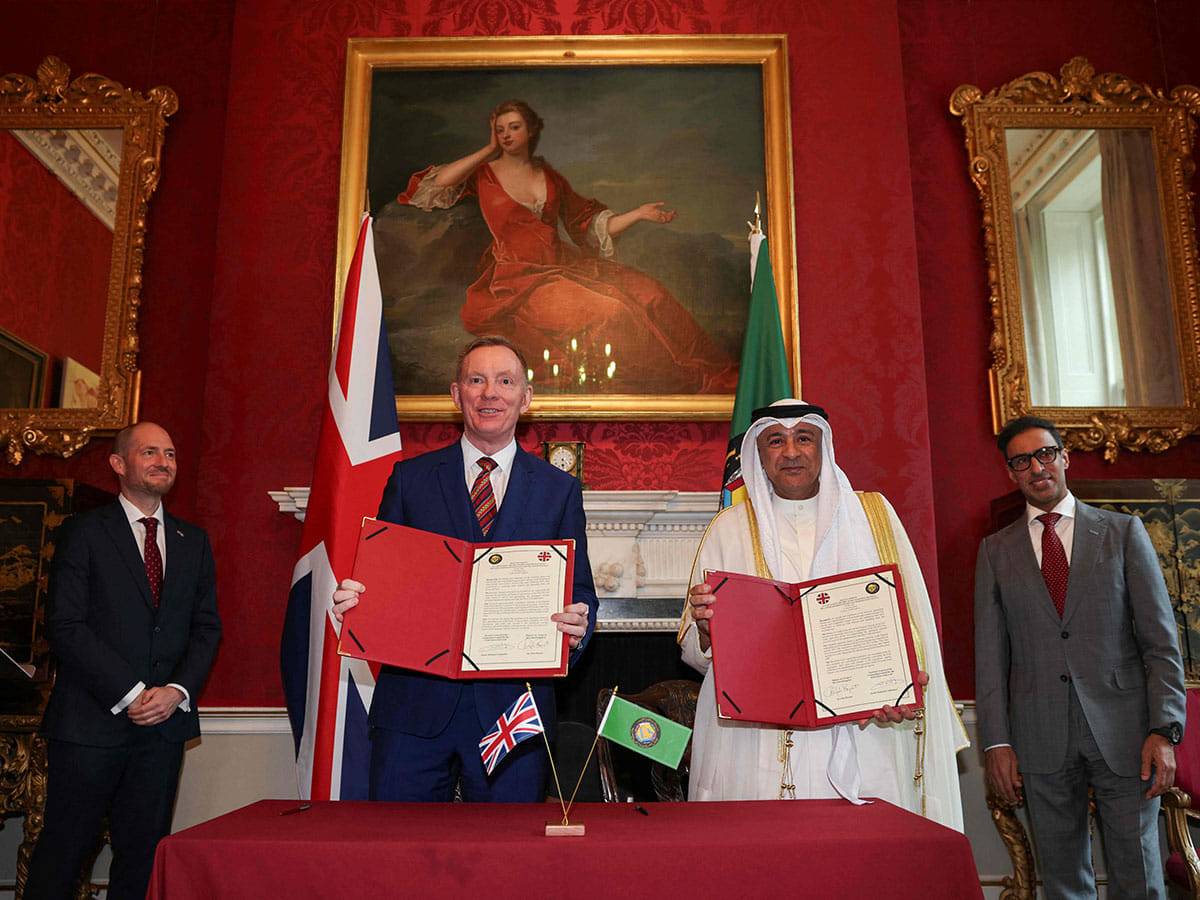 UK's Minister of State for Trade Chris Bryant (centre L) and Jasem Mohamed Albudaiwi (centre R), secretary general of the Gulf Cooperation Council, after a signing ceremony at Downing Street in London on May 20, 2026.  