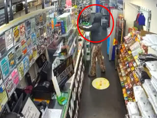 CCTV footage shows the suspected attacker opening fire inside the supermarket during the shooting incident.