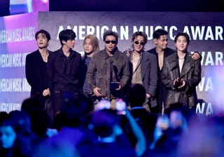 Jungkook, Jin, Jimin, RM, J-Hope, V and Suga of BTS accept the Artist of the Year award onstage during the 52nd American Music Awards at MGM Grand Garden Arena on May 25, 2026 in Las Vegas, Nevada.