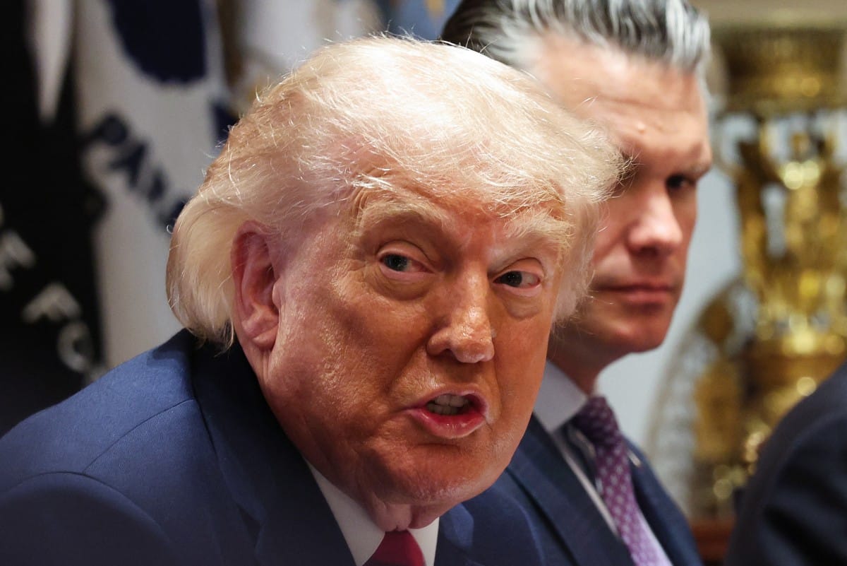 President Donald Trump speaks as U.S. Secretary of War Pete Hegseth listens during a Cabinet meeting in the Cabinet Room of the White House on May 27, 2026 in Washington, DC. Trump meets with his Cabinet days after saying a peace deal with Iran was “largely negotiated” amid expectations around the re-opening the Strait of Hormuz.