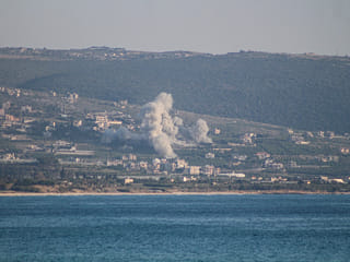 Smoke rises from the site of an Israeli strike that targeted the southern Lebanese village Mansoura on May 23, 2026.