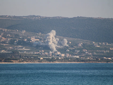 Smoke rises from the site of an Israeli strike that targeted the southern Lebanese village Mansoura on May 23, 2026.