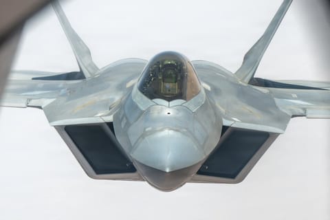 An F-22 Raptor during an aerial refueling: The US Central Command said that its aircraft carried out "defensive strikes" in southern Iran against targets including ​boats attempting ​to lay mines and ⁠missile launch sites. Attacks took place around Bandar Abbas and Larak Island in the Strait of Hormuz.