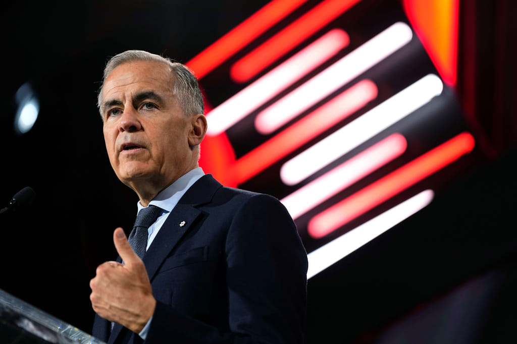 Canadian Prime Minister Mark Carney makes an address at the Canadian Association of Defense and Security Industries annual defense industry trade show CANSEC, in Ottawa, on Wednesday, May 27, 2026. (Justin Tang/The Canadian Press via AP)