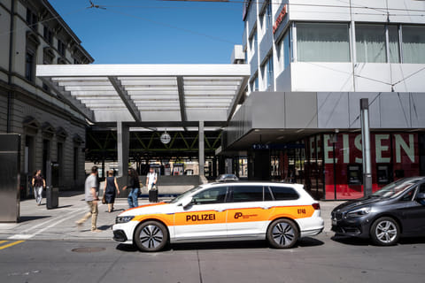 A police vehicle is parked in front of Winterthur train station following a stabbing attack in Winterthur, Switzerland, Thursday, May 28, 2026. (Claudio Thoma/Keystone via AP)