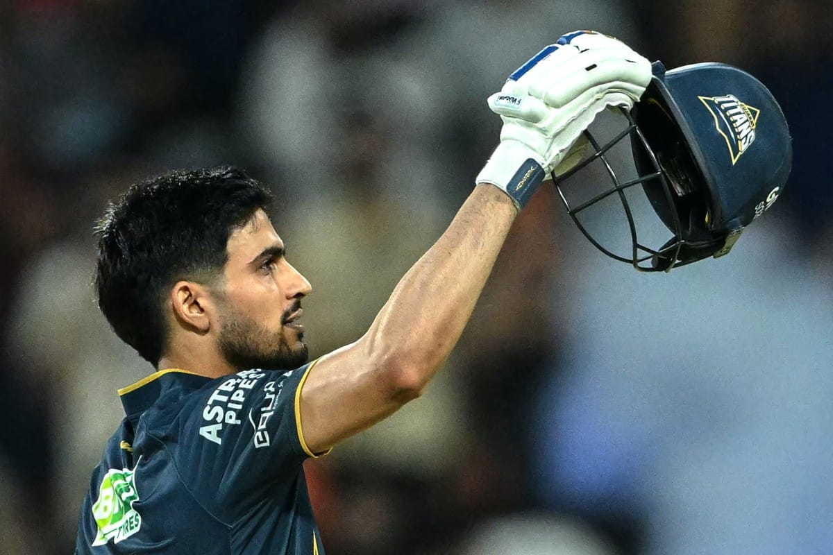 Gujarat Titans' captain Indian cricket player Shubman Gill celebrates after scoring a century (100 runs) during the 2026 Indian Premier League (IPL) T20 Second Qualifier match between Rajasthan Royals and Gujarat Titans at the Maharaja Yadavindra Singh International Cricket Stadium on the outskirts of Chandigarh on May 29, 2026.