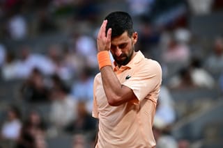Serbia's Novak Djokovic reacts to his defeat at the end of his men's singles match against Brazil's Joao Fonseca on day 6 of the French Open tennis tournament on Court Philippe-Chatrier at the Roland-Garros Complex in Paris on May 29, 2026.