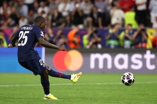 Paris Saint-Germain's Portuguese defender #25 Nuno Mendes takes a penalty during the penalty shootout during the UEFA Champions League final football match between Paris Saint-Germain (PSG) and Arsenal FC at the Puskas Arena in Budapest on May 30, 2026.